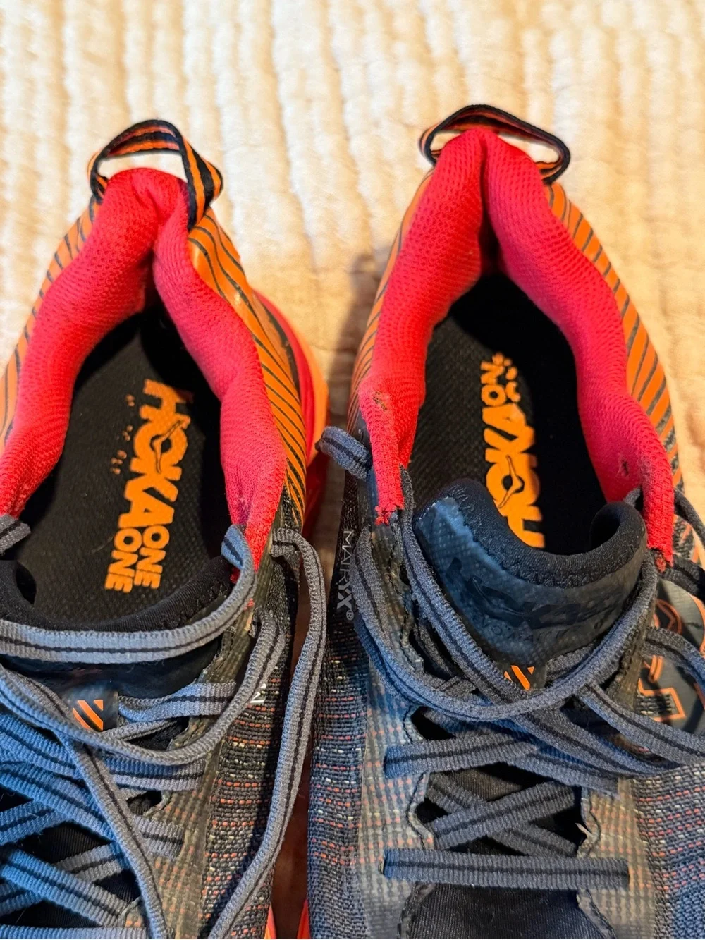 Hoka Men's Black and Orange Trail Running Shoes